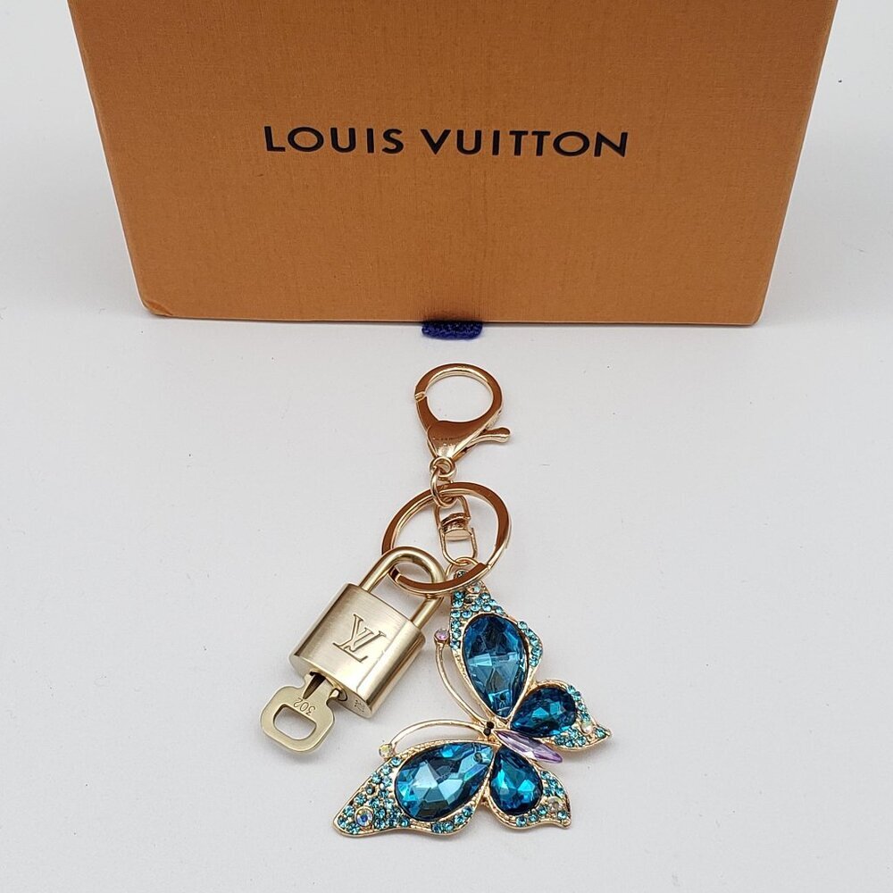 Authentic Louis Vuitton Gold Lock & Box w/ Unbranded Butterfly Bagcharm
